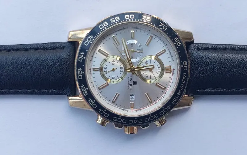 Coral – Premium Analog Classic Watch For Men With Date Function | Genuine Leather Strap | 3 ATM Water Resistant A tachymeter is functional only on watches that have a chronograph (stopwatch) on Best Price: 40,000frw